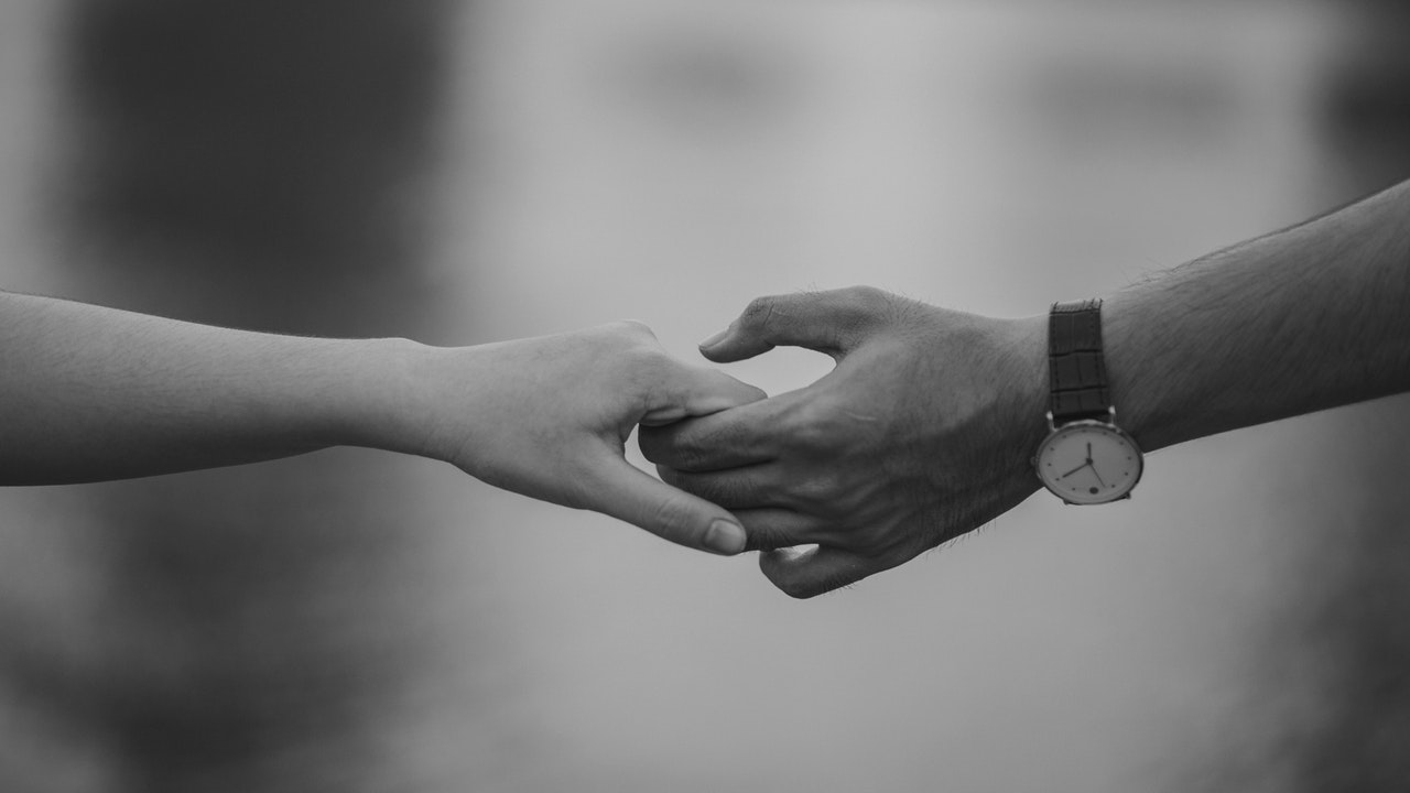 black and white couple hands